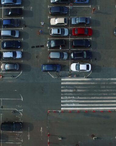 birds-eye-view-cars-moving-at-mall-parking-place-o-2026-01-11-08-31-58-utc-scaled