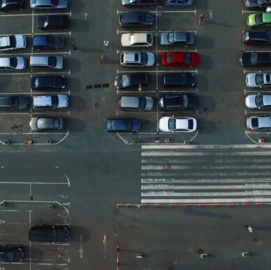 birds-eye-view-cars-moving-at-mall-parking-place-o-2026-01-11-08-31-58-utc-scaled